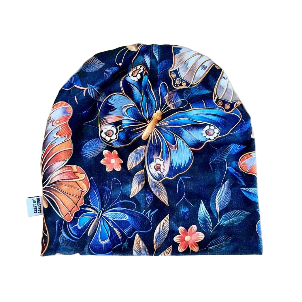Mössa - Marinblå med fjärilar